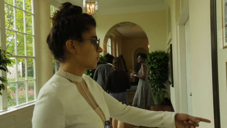 Kiran pointing at walls-5